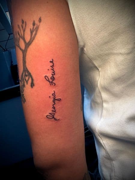 Script + Lettering lettering tattoo on Upper Arm by Jr on TattMe