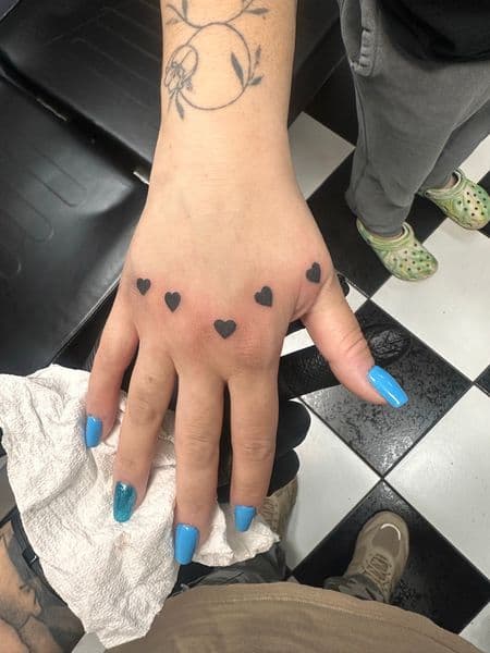 Minimalist + Fine Line hearts tattoo on Hand by Jr on TattMe