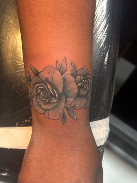 Black & Grey + Floral roses tattoo on Wrist by Jr on TattMe