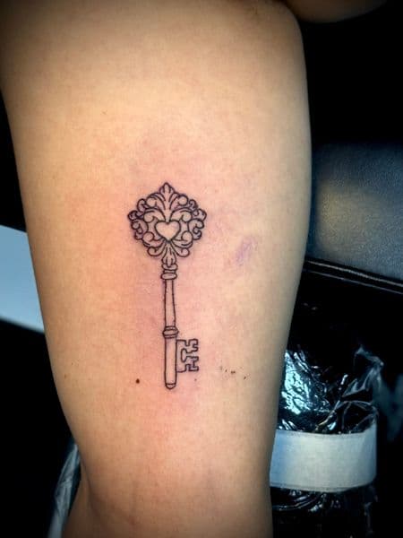 Fine Line + Minimalist key tattoo on Upper Arm by Jr on TattMe