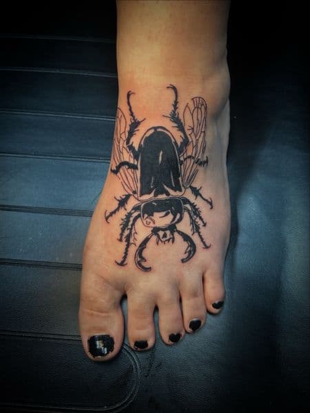 Black-work + Line-work beetle tattoo on Foot by Jr on TattMe