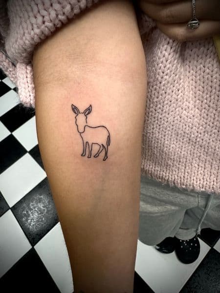Fine Line + Minimalist donkey tattoo on Upper Arm by Jr on TattMe