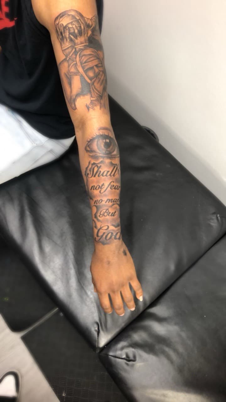 Black & Grey + Lettering figure tattoo on Half Sleeve by Tattsbyap on TattMe