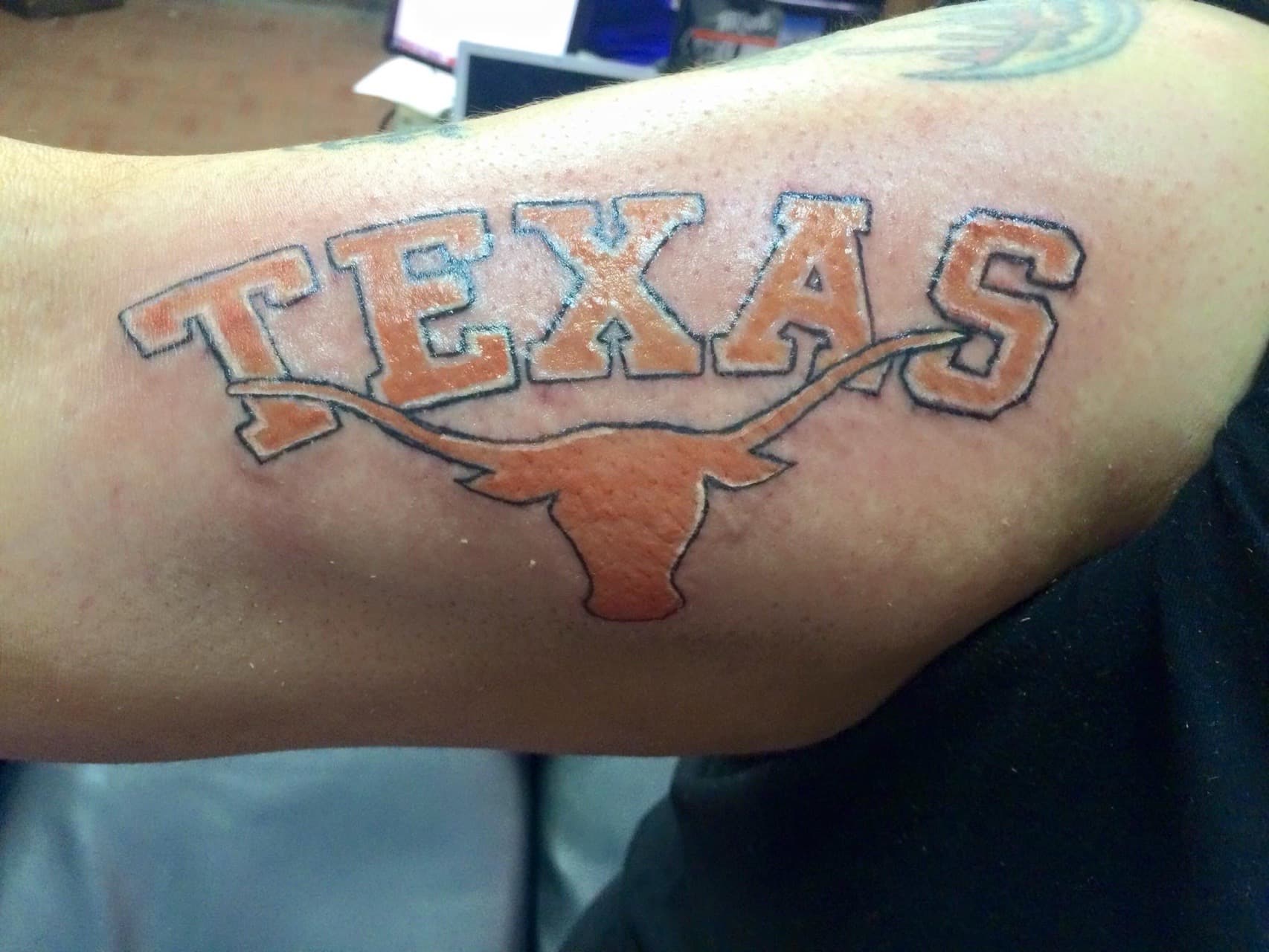 Color + Lettering texas tattoo on Upper Arm by Tattoos_by_Ivan on TattMe