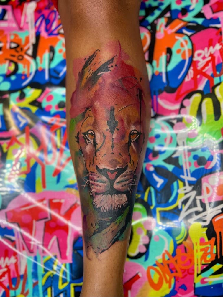 Watercolor + Color lion tattoo on Calf by MillzyInk on TattMe