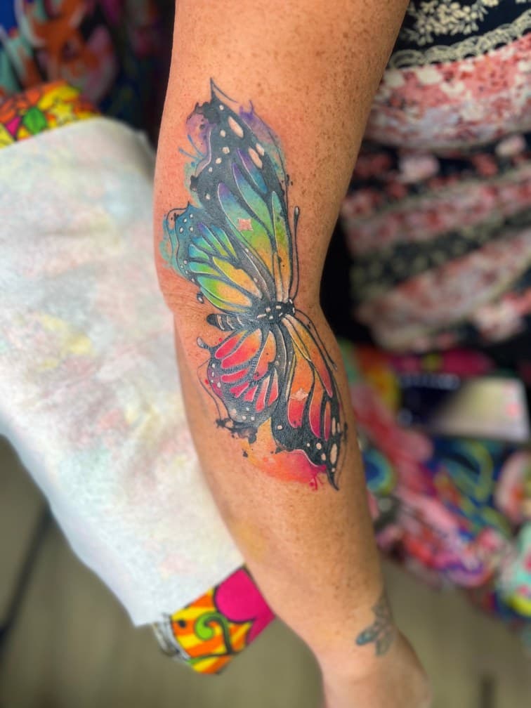 Watercolor + Illustrative butterfly tattoo on Upper Arm by MillzyInk on TattMe