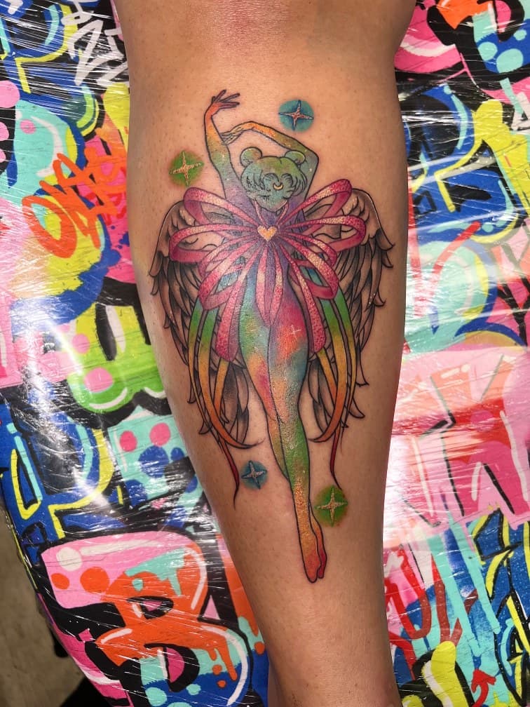 Color + Anime wings tattoo on Calf by MillzyInk on TattMe