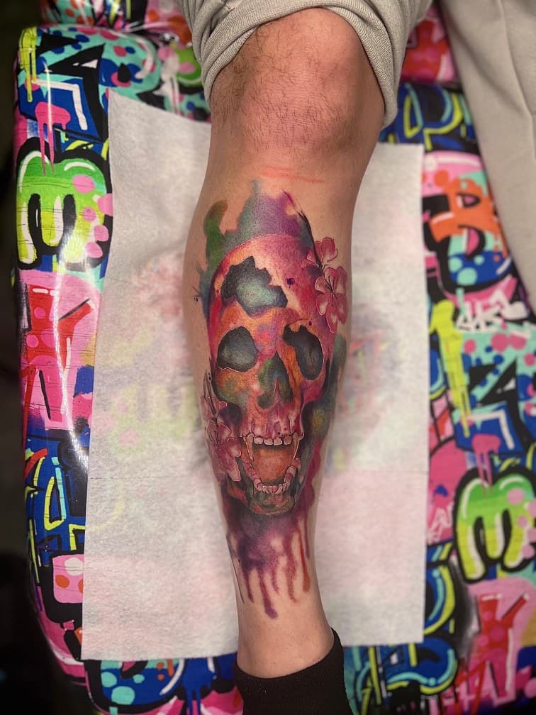 Color + Watercolor skull tattoo on Calf by MillzyInk on TattMe