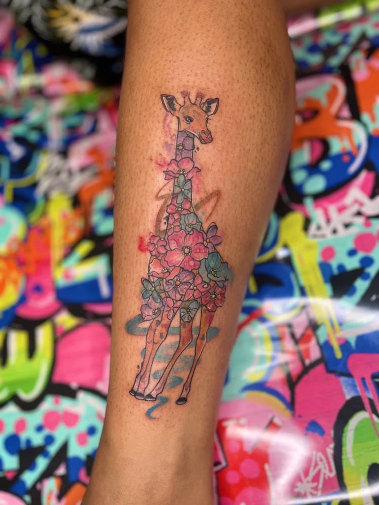 Illustrative + Floral giraffe tattoo on Calf by MillzyInk on TattMe