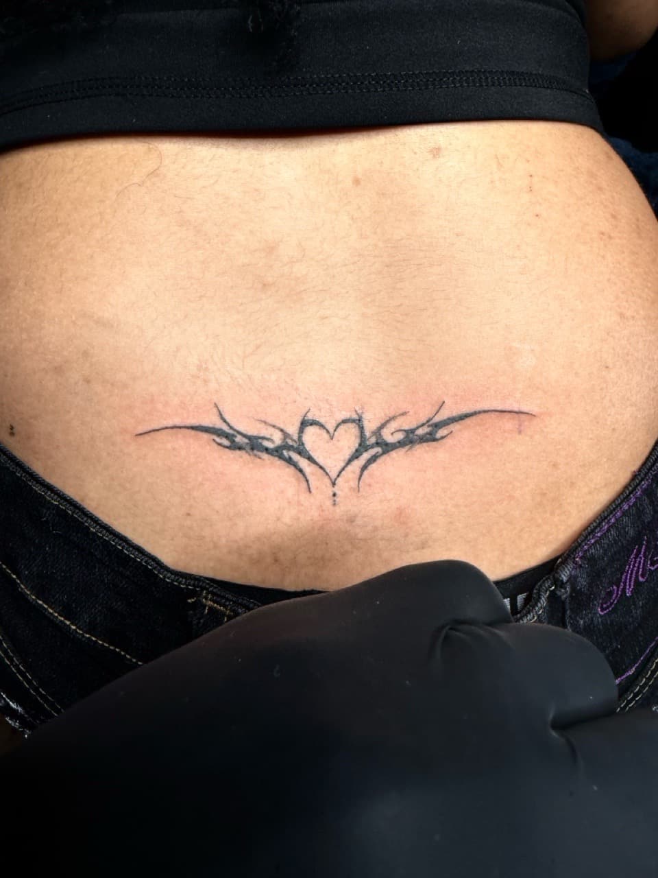 Black-work + Tribal heart tattoo on Lower Back by Chris_Brooks on TattMe