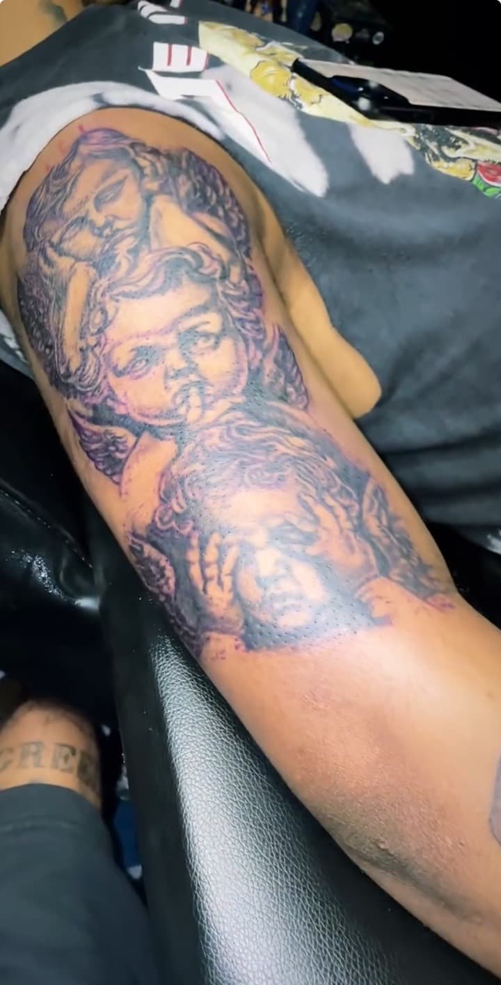 Realism + Black & Grey cherubs tattoo on Upper Arm by Chris_Brooks on TattMe