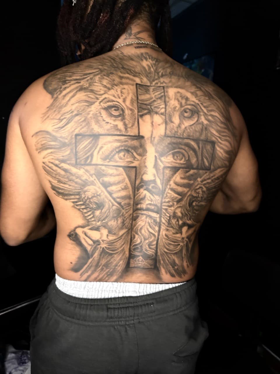Black & Grey + Realism lion tattoo on Upper Back by Chris_Brooks on TattMe