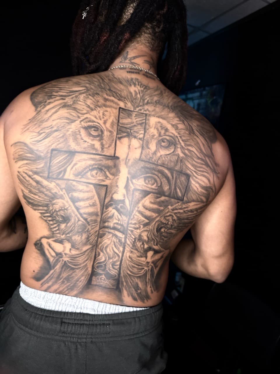 Black & Grey + Realism lion tattoo on Upper Back by Chris_Brooks on TattMe