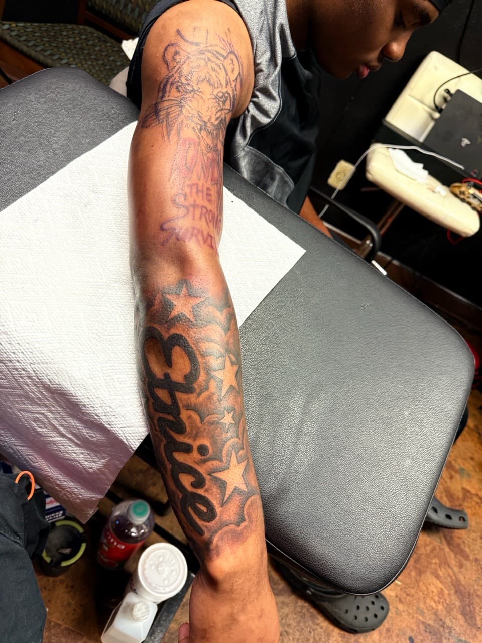 Black & Grey + Lettering tiger tattoo on Half Sleeve by Chris_Brooks on TattMe