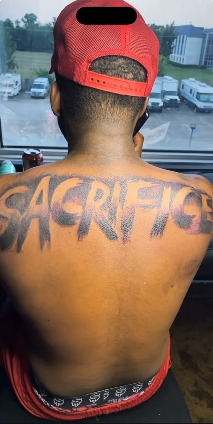 Lettering + Black-work sacrifice tattoo on Upper Back by Chris_Brooks on TattMe