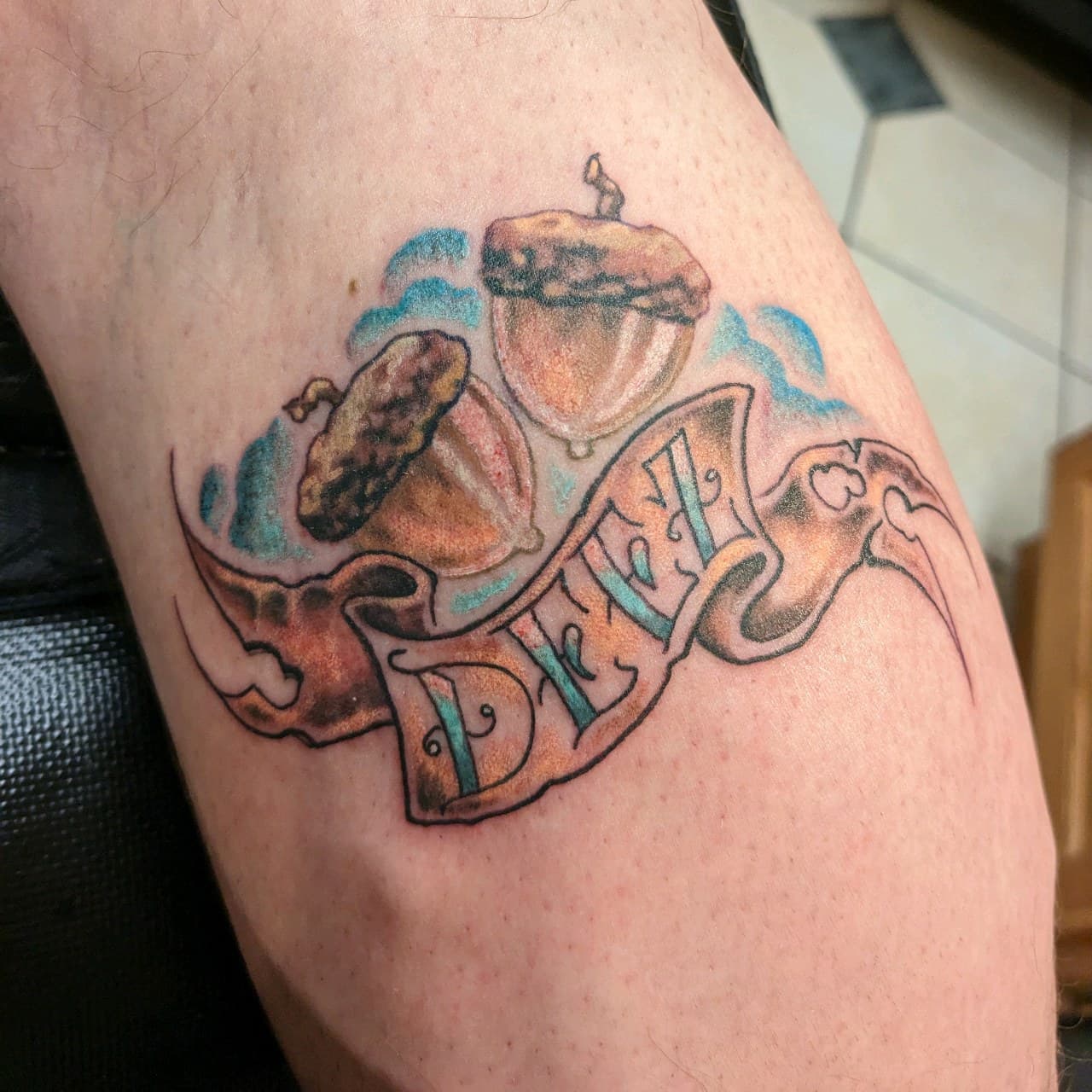 Color + Illustrative acorns tattoo on Forearm by affiliatedtattoofamily on TattMe