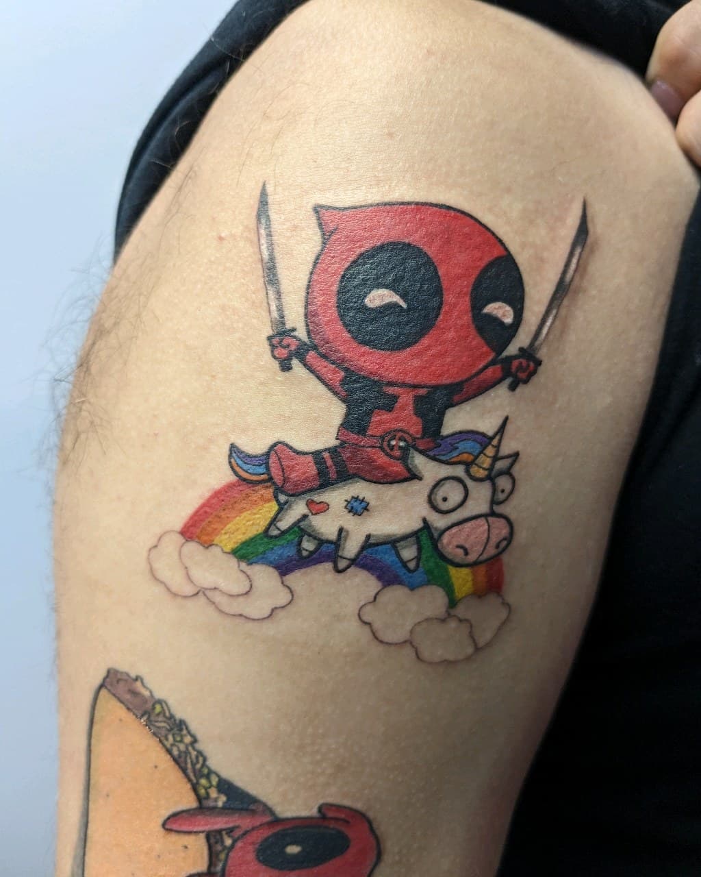 Cartoon + Pop Culture deadpool tattoo on Upper Arm by affiliatedtattoofamily on TattMe