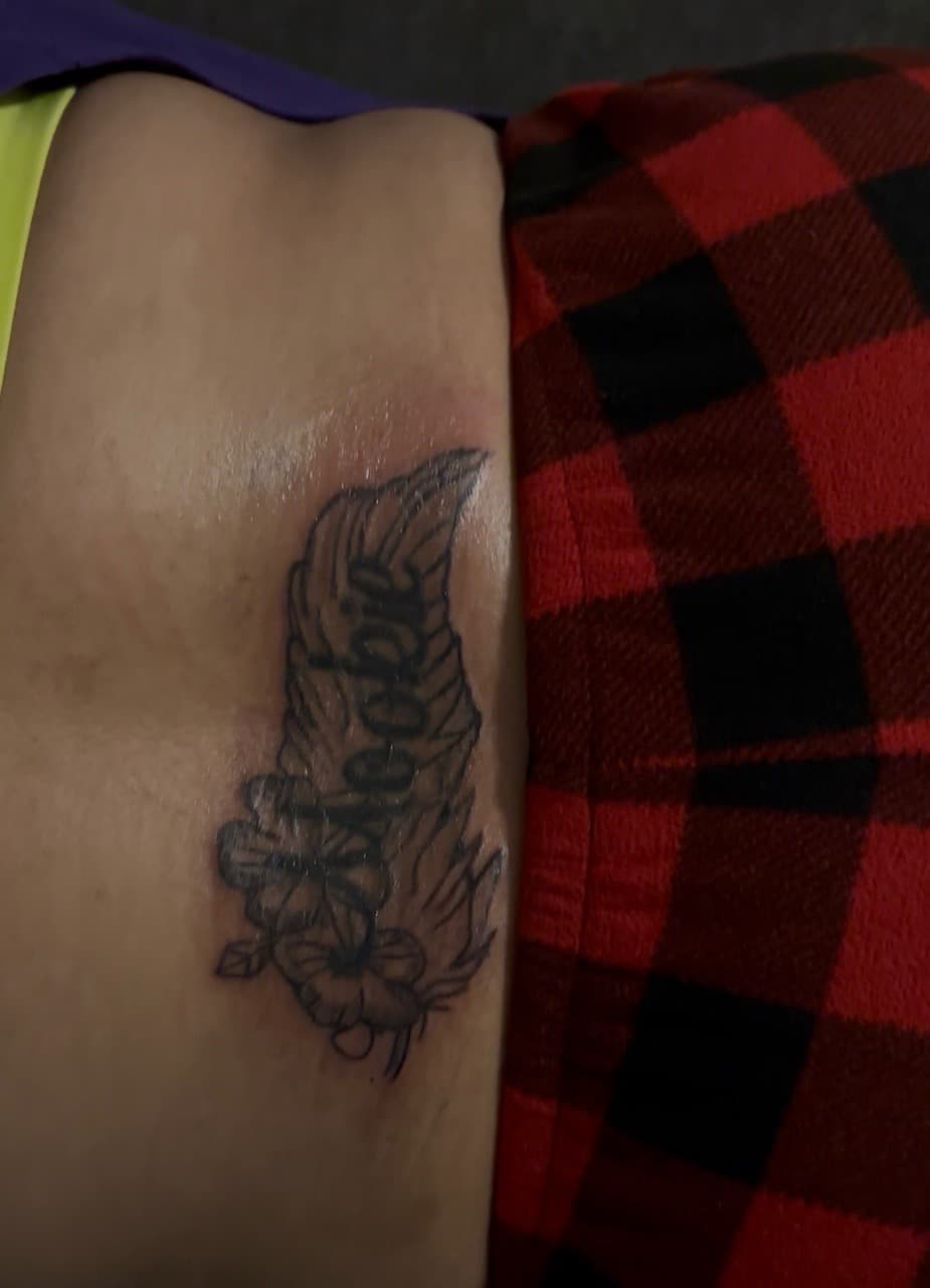 Black-work + Illustrative feather tattoo on Ribs by BreezyInk on TattMe
