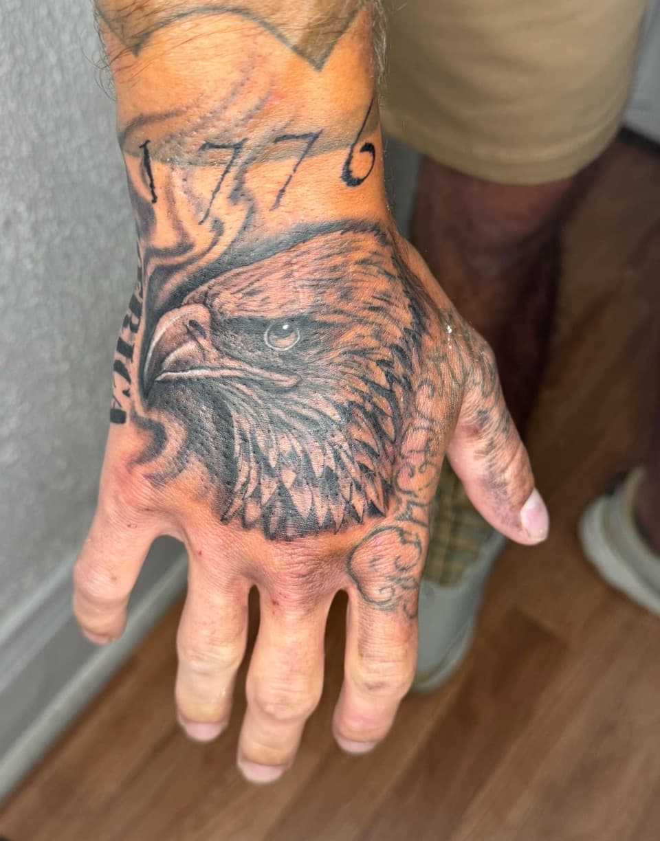 Black & Grey + Realism eagle tattoo on Hand by KRUZ_TATTOOS on TattMe