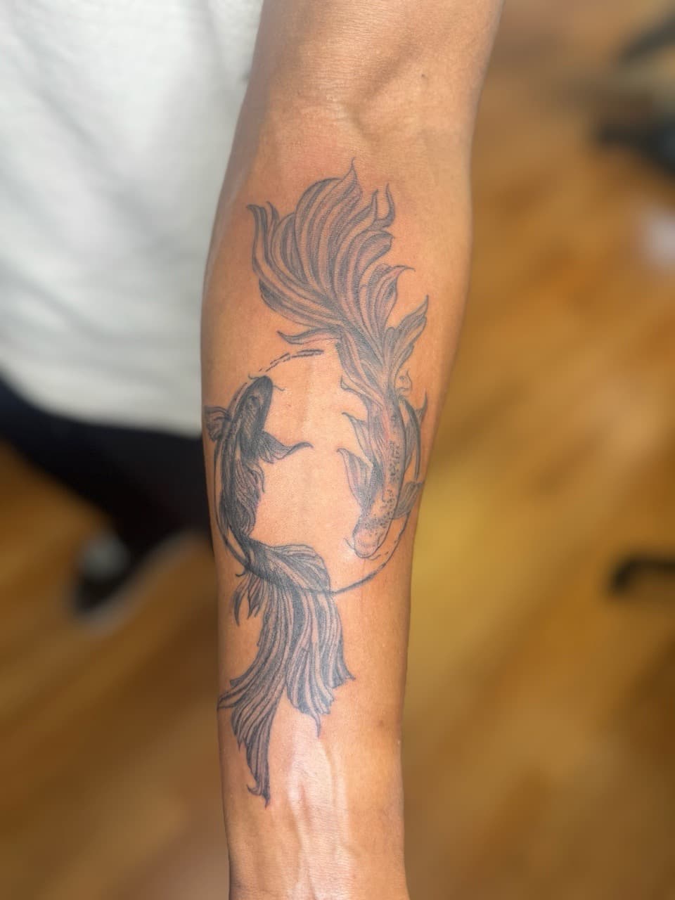 Black & Grey + Fine Line koi fish tattoo on Forearm by KRUZ_TATTOOS on TattMe