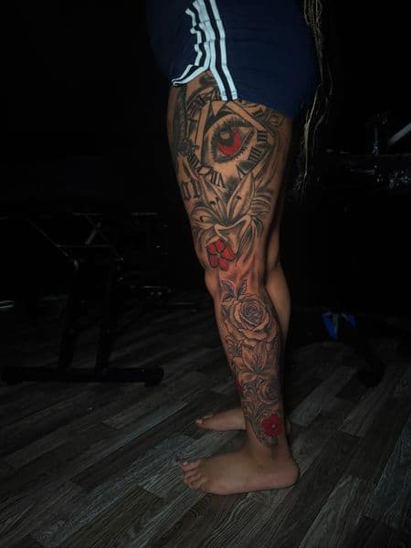 Black & Grey + Color eye tattoo on Full Leg Sleeve by JST on TattMe