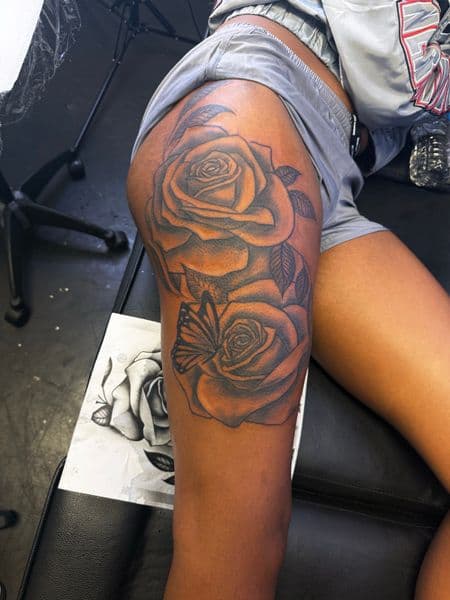 Black & Grey + Floral roses tattoo on Thigh by JST on TattMe