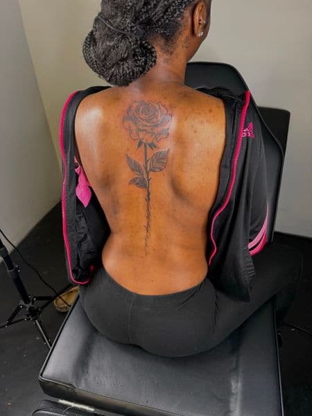 Black & Grey + Floral rose tattoo on Spine by JST on TattMe