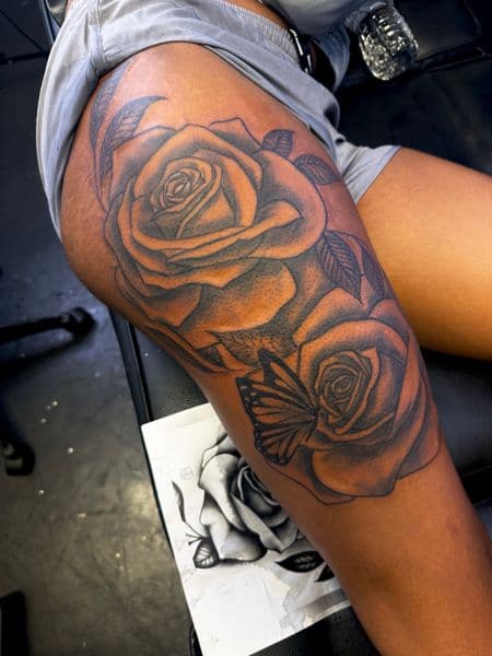 Black & Grey + Floral roses tattoo on Thigh by JST on TattMe