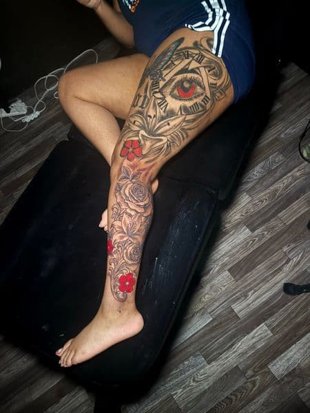 Black & Grey + Floral eye tattoo on Full Leg Sleeve by JST on TattMe