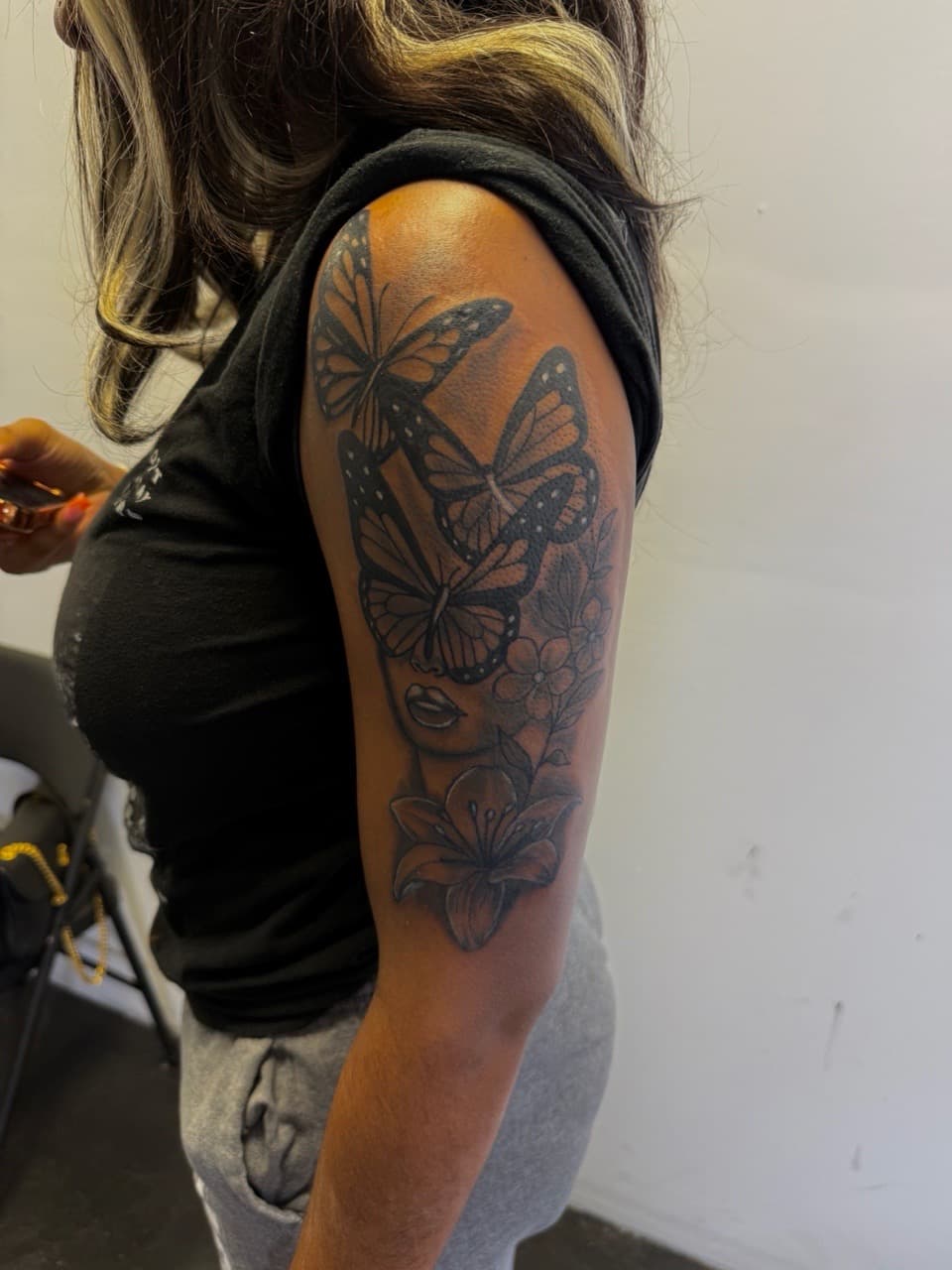 Black & Grey + Illustrative butterflies tattoo on Upper Arm by JST on TattMe