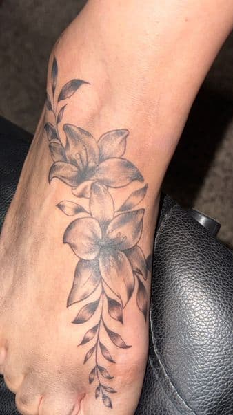 Floral + Black & Grey flowers tattoo on Foot by osoinks on TattMe