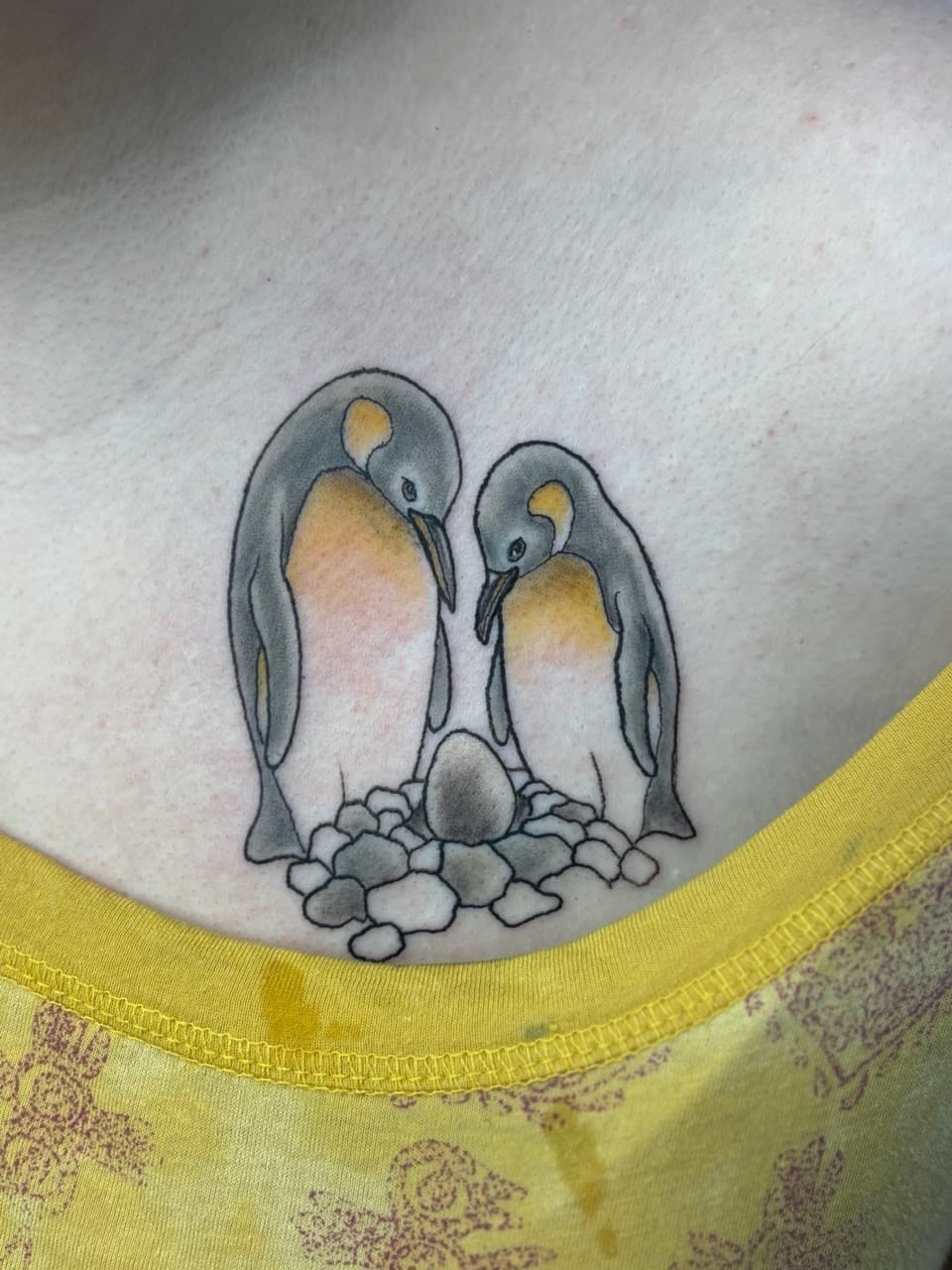 Color + Illustrative penguins tattoo on Sternum by AdrianWareTattoos on TattMe