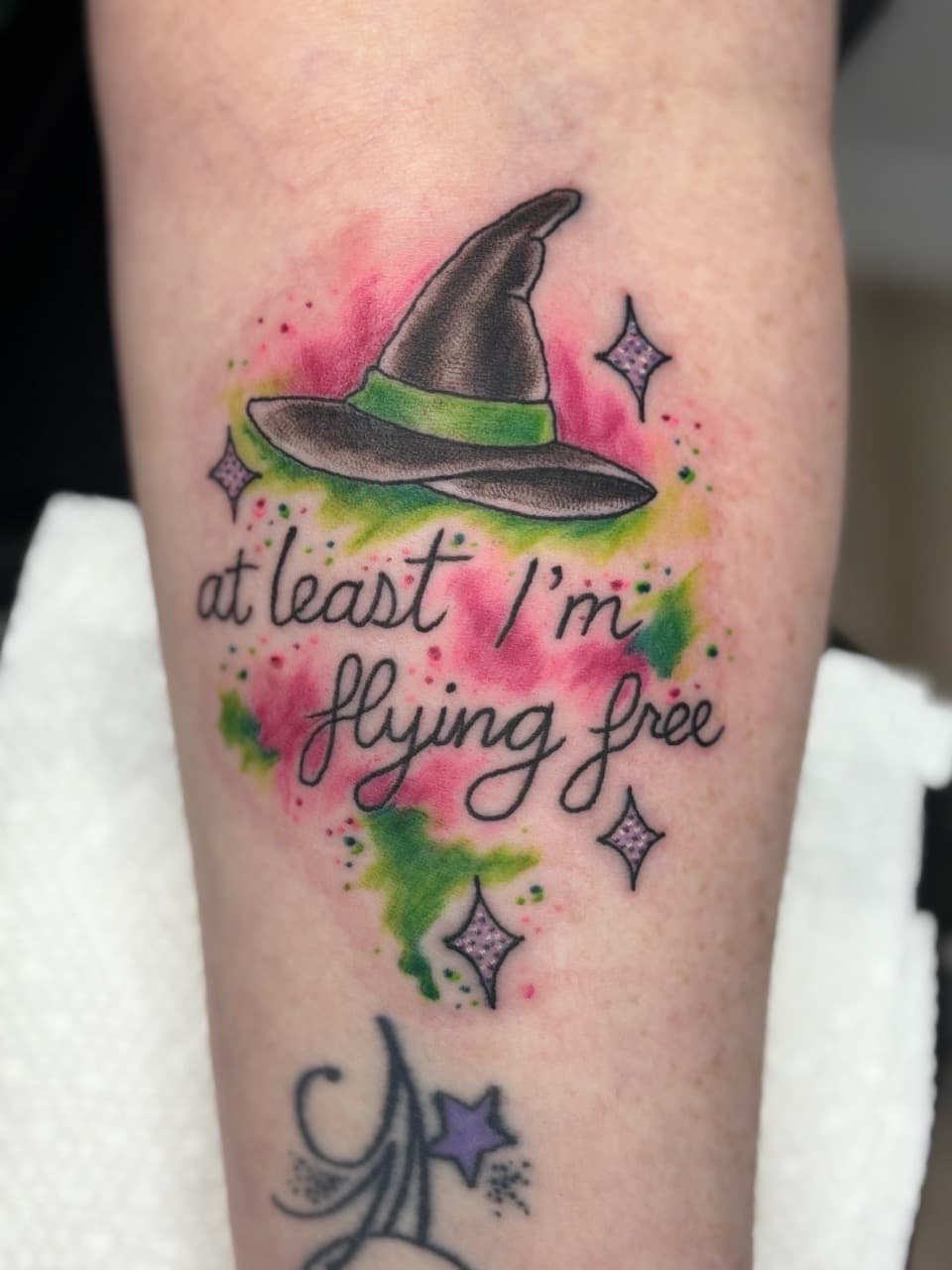 Watercolor + Script witch hat tattoo on Forearm by AdrianWareTattoos on TattMe