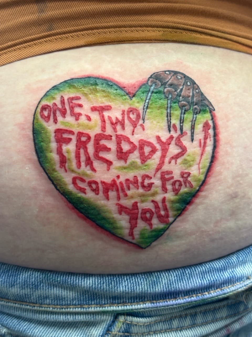 Color + New School heart tattoo on Lower Back by AdrianWareTattoos on TattMe