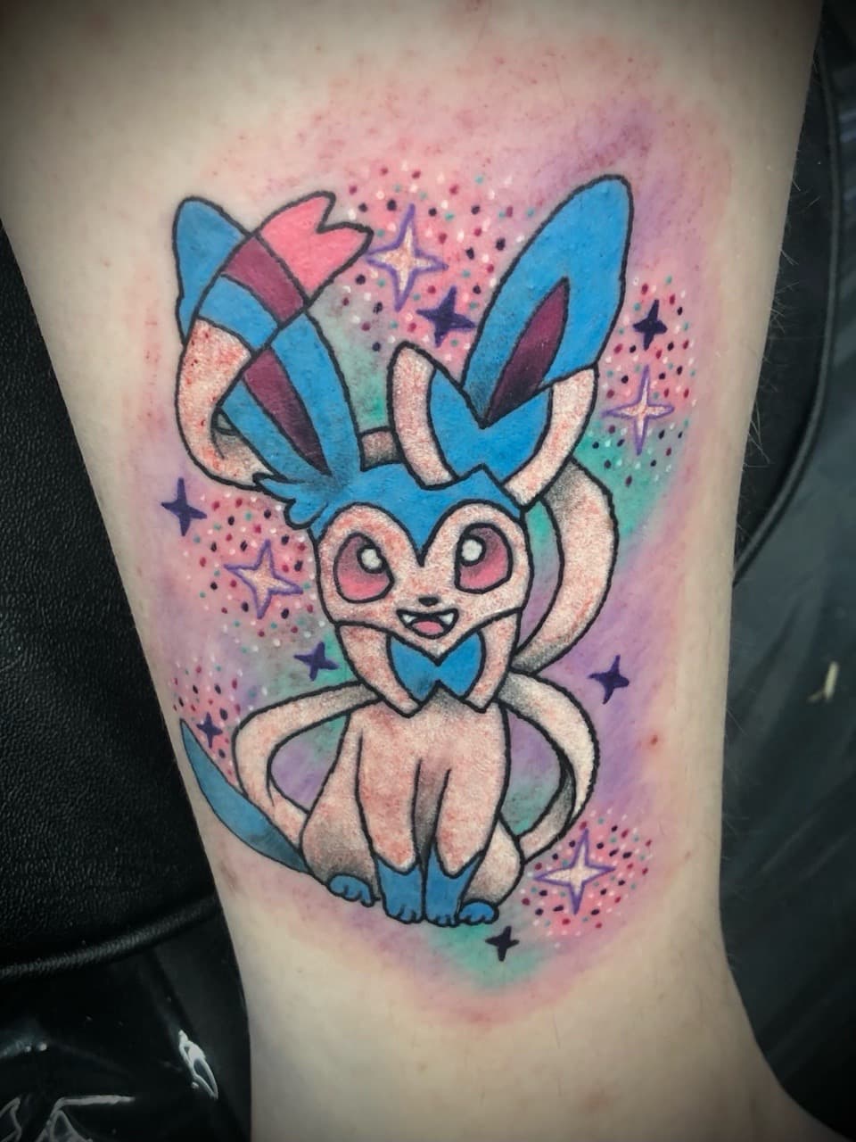 Anime + Pop Culture sylveon tattoo on Calf by AdrianWareTattoos on TattMe