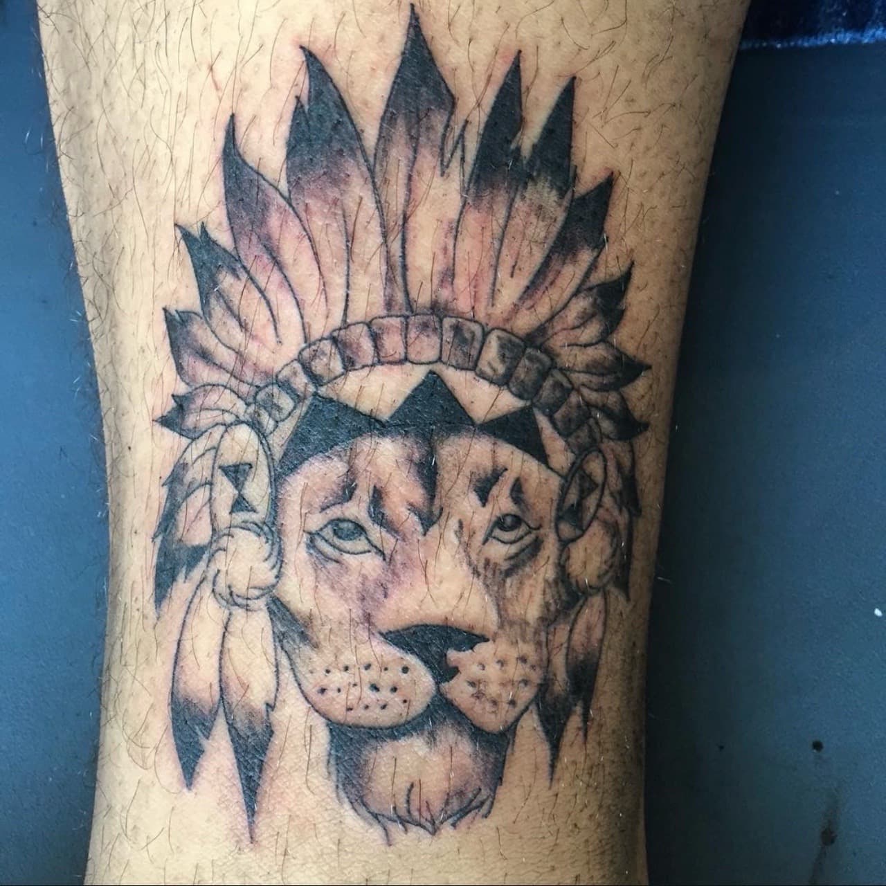 Black & Grey + Illustrative lion tattoo on Calf by Art_by_Prynce on TattMe
