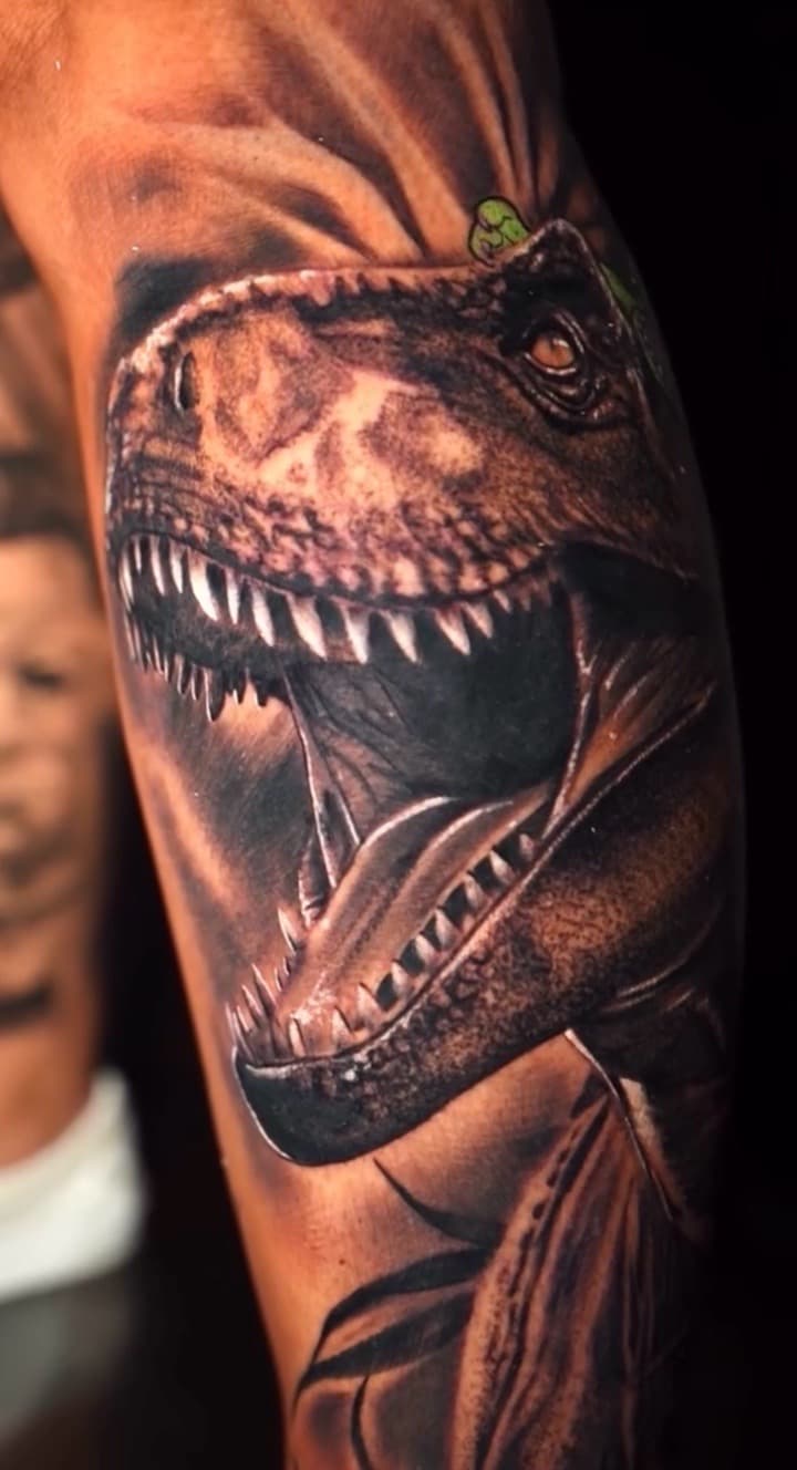 Realism + Black & Grey dinosaur tattoo on Upper Arm by Tattoosbyjm on TattMe