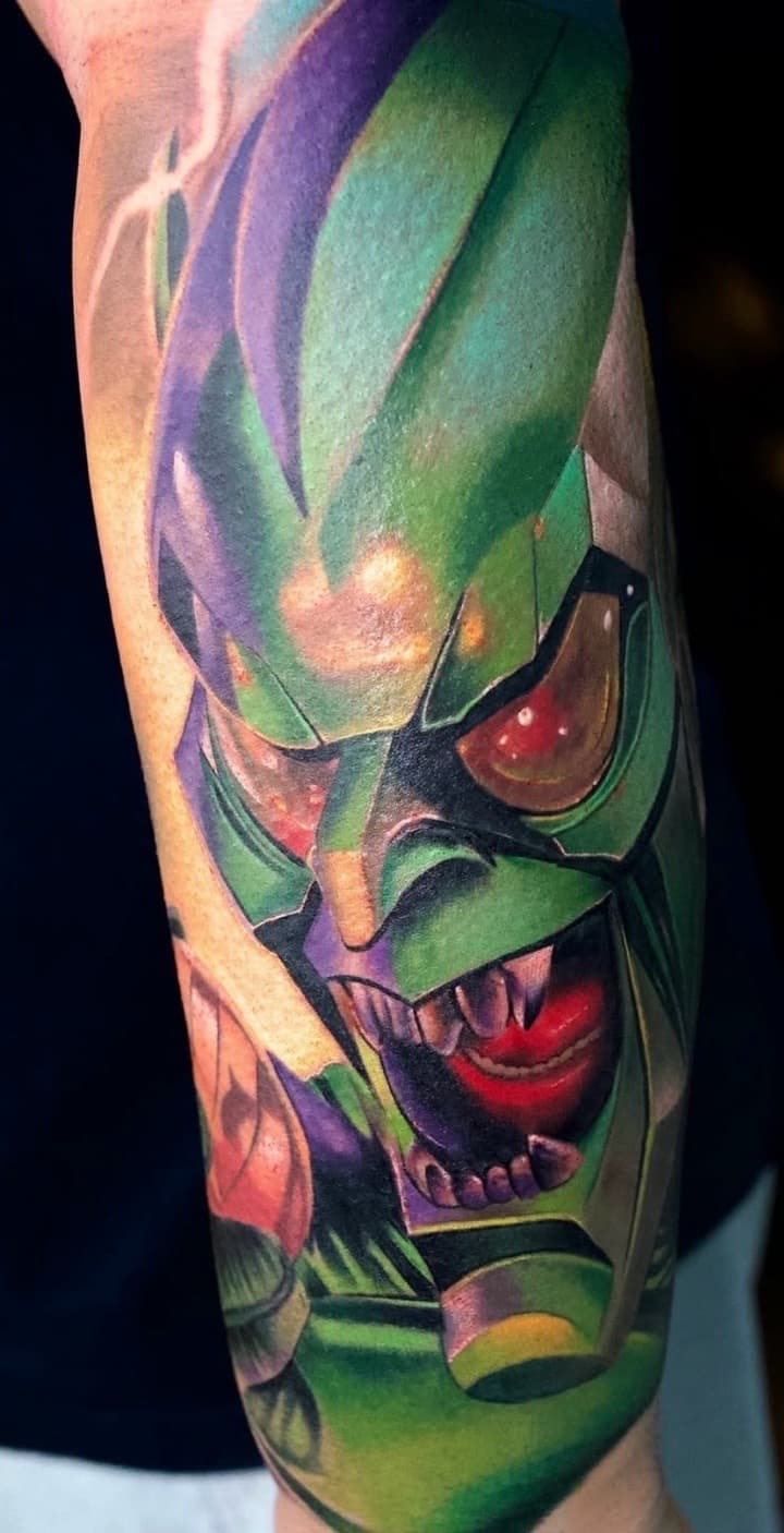 Color + Illustrative green goblin tattoo on Upper Arm by Tattoosbyjm on TattMe