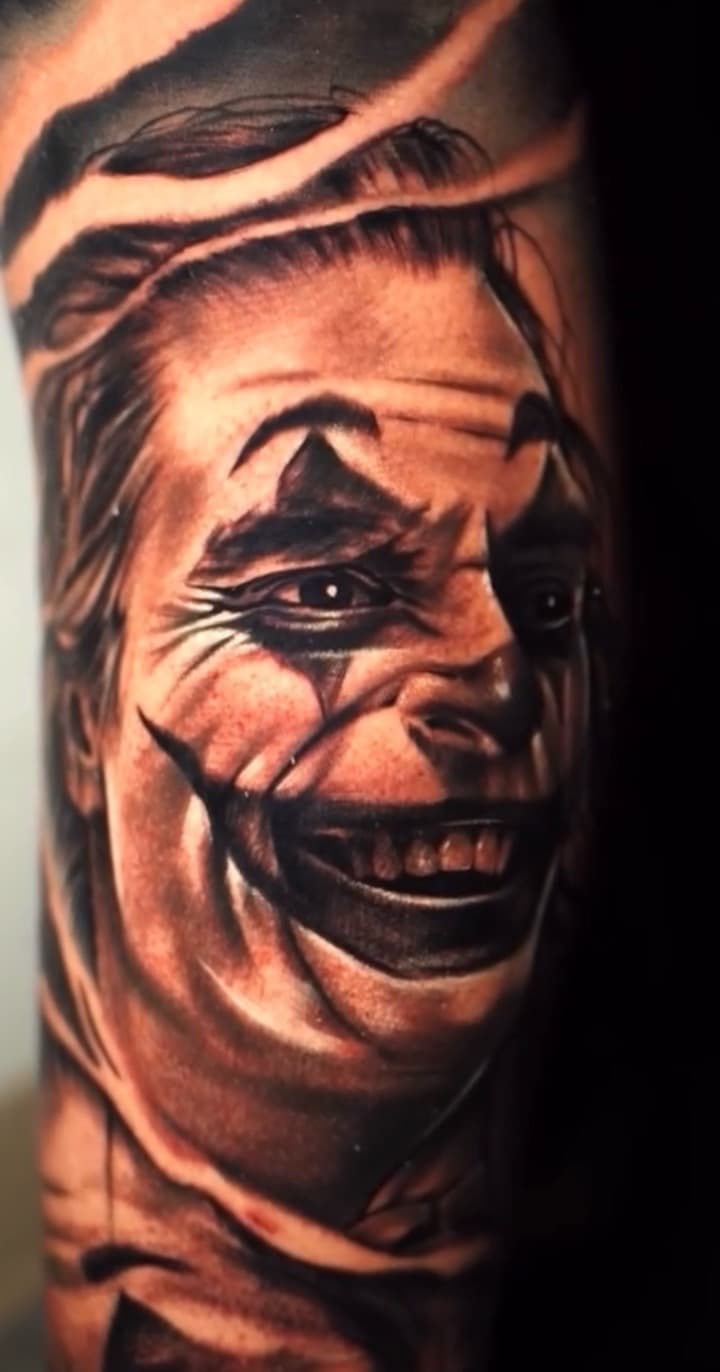 Realism + Black & Grey joker tattoo on Upper Arm by Tattoosbyjm on TattMe