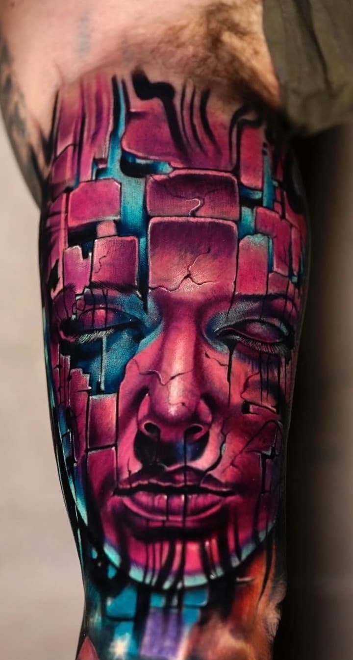 Surrealism + Color fragmented tattoo on Upper Arm by Tattoosbyjm on TattMe