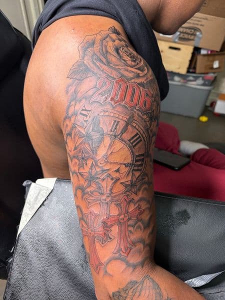 Black & Grey + Illustrative rose tattoo on Upper Arm by hippie.Inkster on TattMe