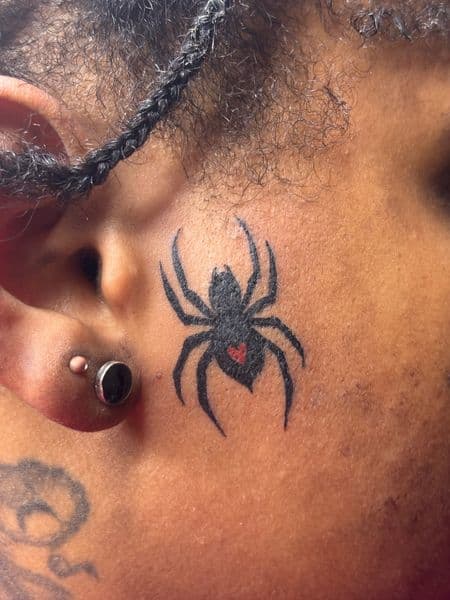 Black-work + Minimalist spider tattoo on Face by hippie.Inkster on TattMe