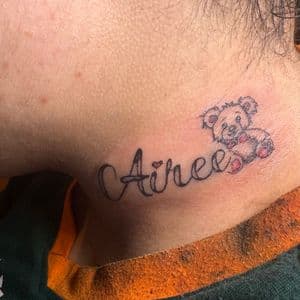 Lettering + Illustrative name tattoo on Neck (Side) by hippie.Inkster on TattMe