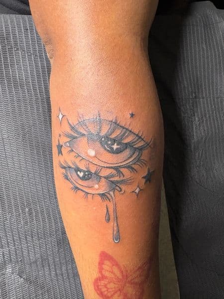 Anime + Illustrative eyes tattoo on Forearm by hippie.Inkster on TattMe