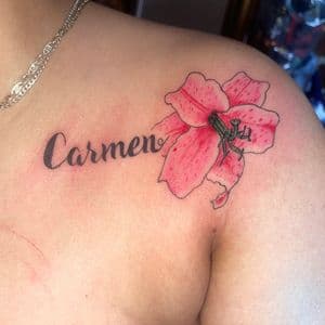 Floral + Script flower tattoo on Shoulder by hippie.Inkster on TattMe