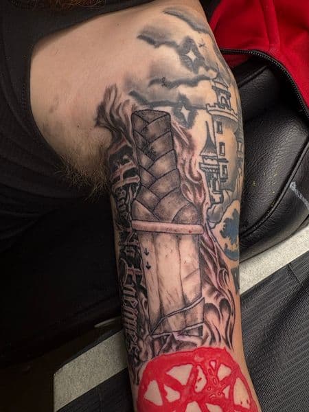 Black & Grey + Illustrative wrapped object tattoo on Upper Arm by hippie.Inkster on TattMe