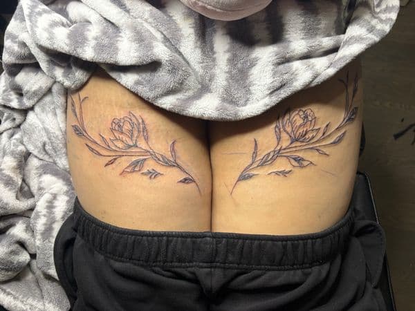 Fine Line + Floral flowers tattoo on Thigh by hippie.Inkster on TattMe