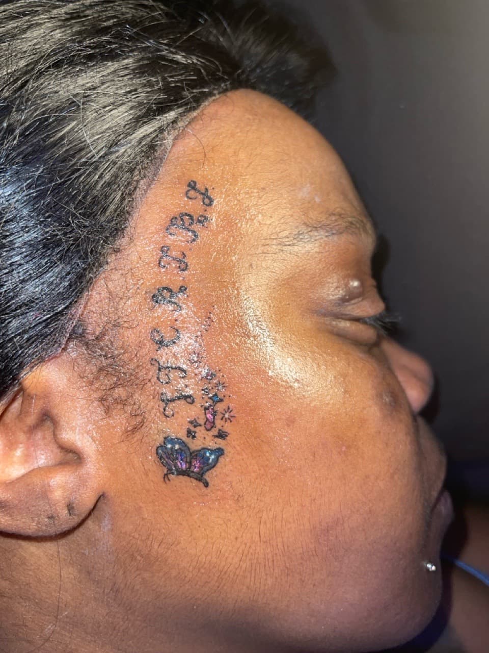Color + Fine Line butterfly tattoo on Face by hippie.Inkster on TattMe