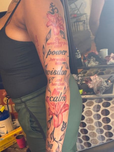 Floral + Lettering flowers tattoo on Full Sleeve by hippie.Inkster on TattMe