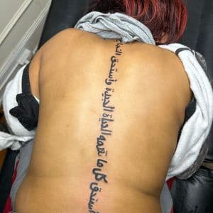 Lettering + Script arabic tattoo on Spine by hippie.Inkster on TattMe